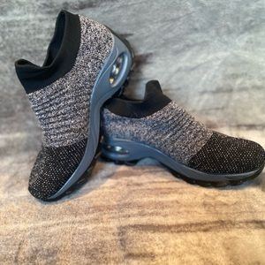 Woman’s slip on shoes. Brand new, never worn. ( med) 7-8 black and white. Comfy